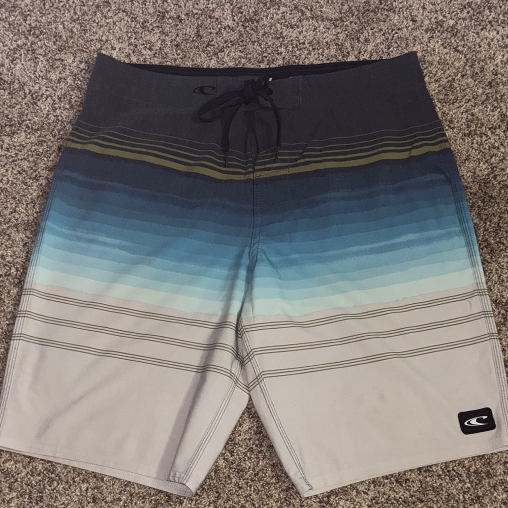 Quiksilver Blue and Gray Board Shorts with Gradient Design
